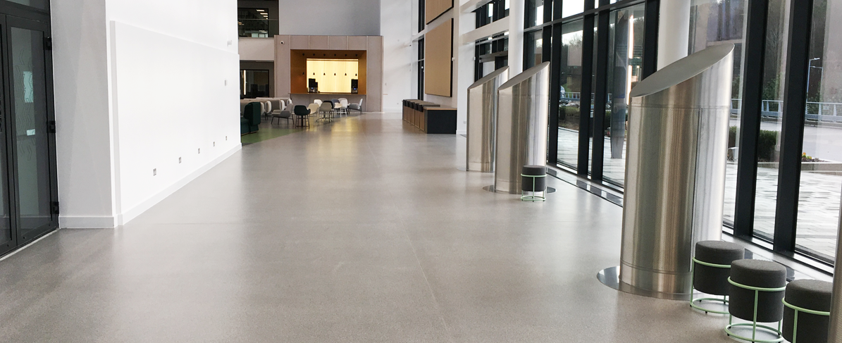 gray flooring in office building hallway